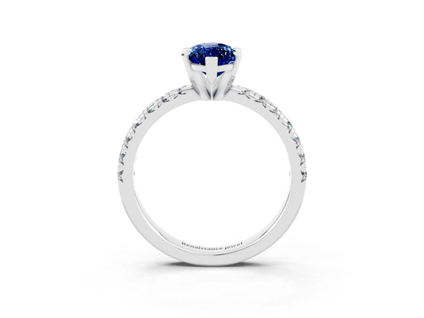 Silver Marquise Cut Blue Sapphire Solitaire Pavé Engagement Ring with Round Band and Prong Setting