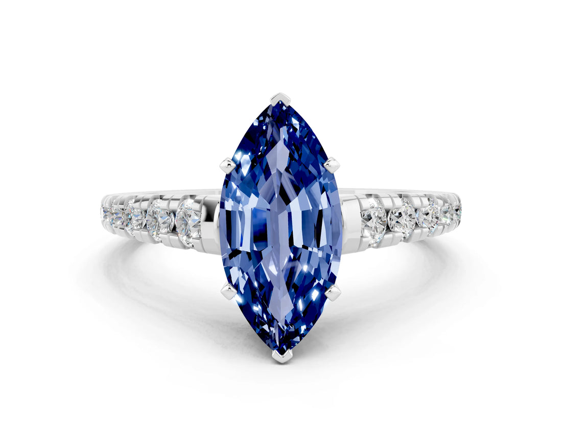 White gold Marquise Cut Blue Sapphire Solitaire Ring with Cathedral Setting and Pavé Band