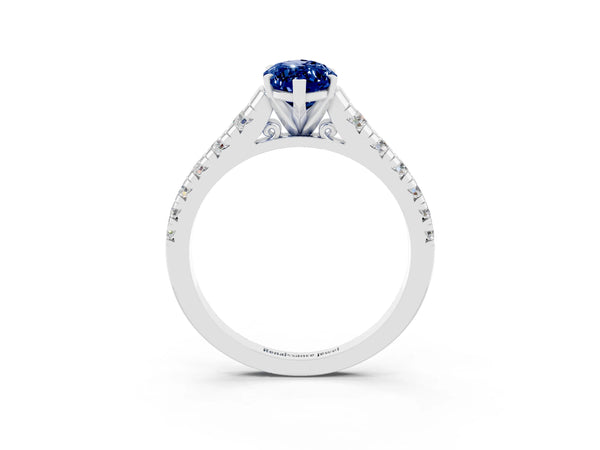 White gold Marquise Cut Blue Sapphire Cathedral Solitaire Ring with Round  Pavé Band