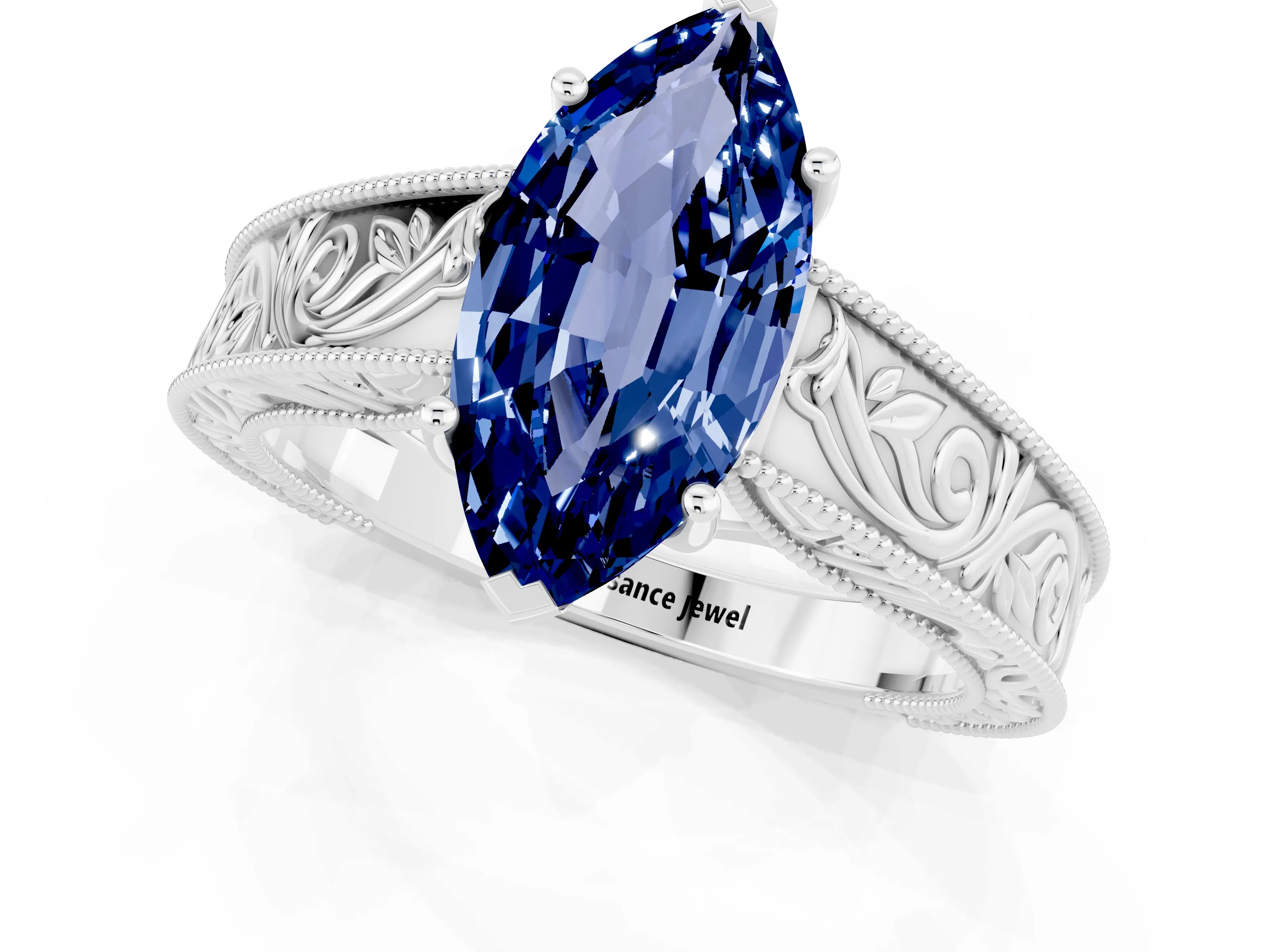 White gold Marquise Cut Blue Sapphire Solitaire Ring with Engraved Band and Four-Prong Setting_1
