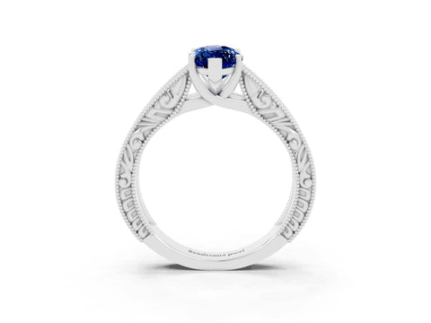 White gold Marquise Cut Blue Sapphire Solitaire Ring with Engraved Band and Four-Prong Setting_3