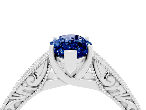 White gold Marquise Cut Blue Sapphire Solitaire Ring with Engraved Band and Four-Prong Setting_4