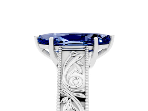 White gold Marquise Cut Blue Sapphire Solitaire Ring with Engraved Band and Four-Prong Setting_5