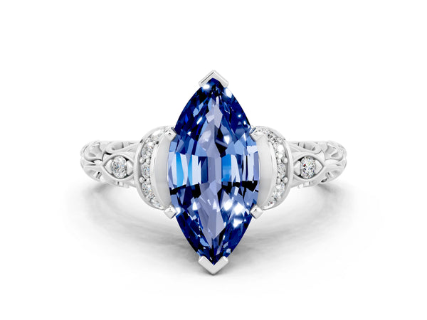 White gold Marquise Cut Blue Sapphire Solitaire Ring with Filigree Band and Four-Prong Setting