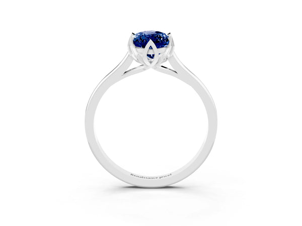 Platinum Marquise Cut Blue Sapphire Solitaire Ring with Flower Prong Setting and Classic Band