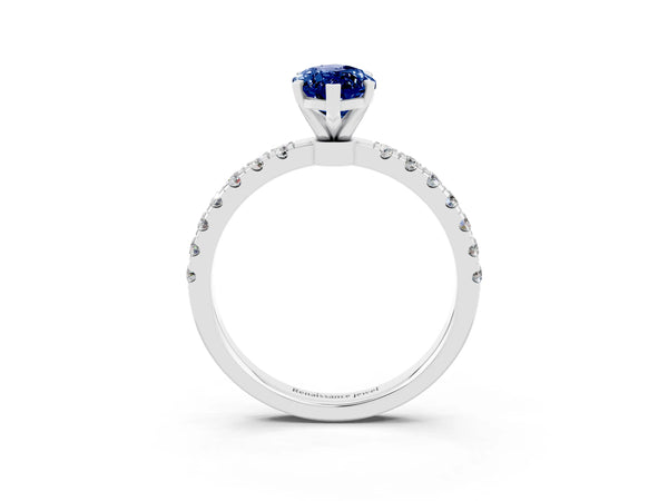 Silver Marquise Cut Blue Sapphire Solitaire Ring with Pavé Accents and Four-Prong Setting