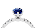 White gold Marquise Cut Blue Sapphire Solitaire Ring with Pavé Accents and Four-Prong Setting_4