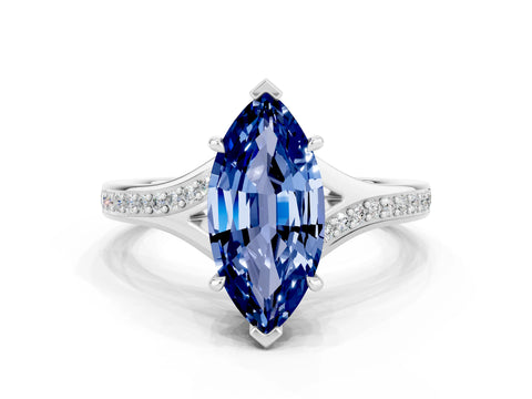 White gold Marquise Cut Blue Sapphire Solitaire Ring with Pavé Band and Prong Setting
