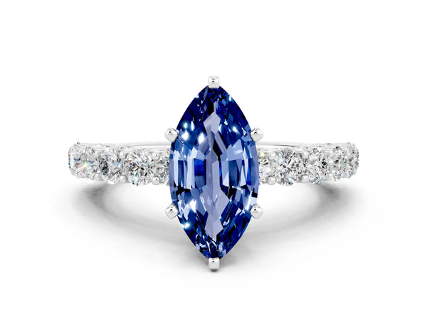White gold Marquise Cut Blue Sapphire Solitaire Ring with Shared Prong Pavé Band and Four-Prong Setting