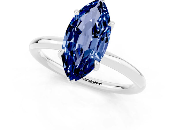 White gold Marquise Cut Blue Sapphire Solitaire Ring with Thin Band and Four-Prong Setting