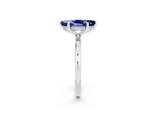 Silver Marquise Cut Blue Sapphire Solitaire Ring with Thin Band and Four-Prong Setting