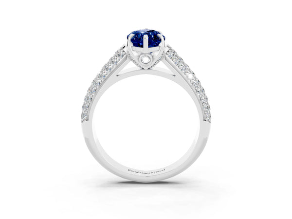White gold Marquise Cut Blue Sapphire Solitaire Ring with Three-Row Pavé Band and Four-Prong Setting