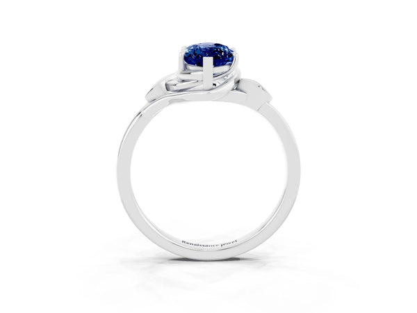 White gold Marquise Cut Blue Sapphire Solitaire Ring with Twist Band and Four-Prong Setting