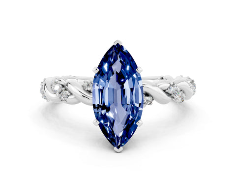 White gold Marquise Cut Blue Sapphire Solitaire Ring with Twisted Band and Pavé Accents