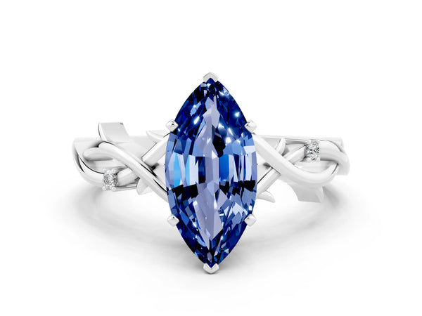 Platinum Marquise Cut Blue Sapphire Solitaire Ring with Twisted Band and Prong Setting