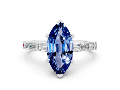 White gold Marquise Cut Blue Sapphire Solitaire with Side Baguettes and Channel Set Band