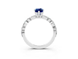 White gold Marquise Cut Blue Sapphire Solitaire with Side Stones on a Pavé Band and Four-Prong Setting_3