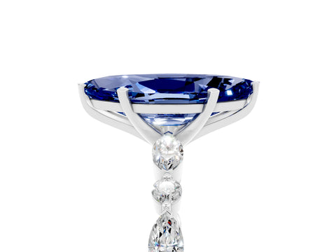White gold Marquise Cut Blue Sapphire Solitaire with Side Stones on a Pavé Band and Four-Prong Setting_5