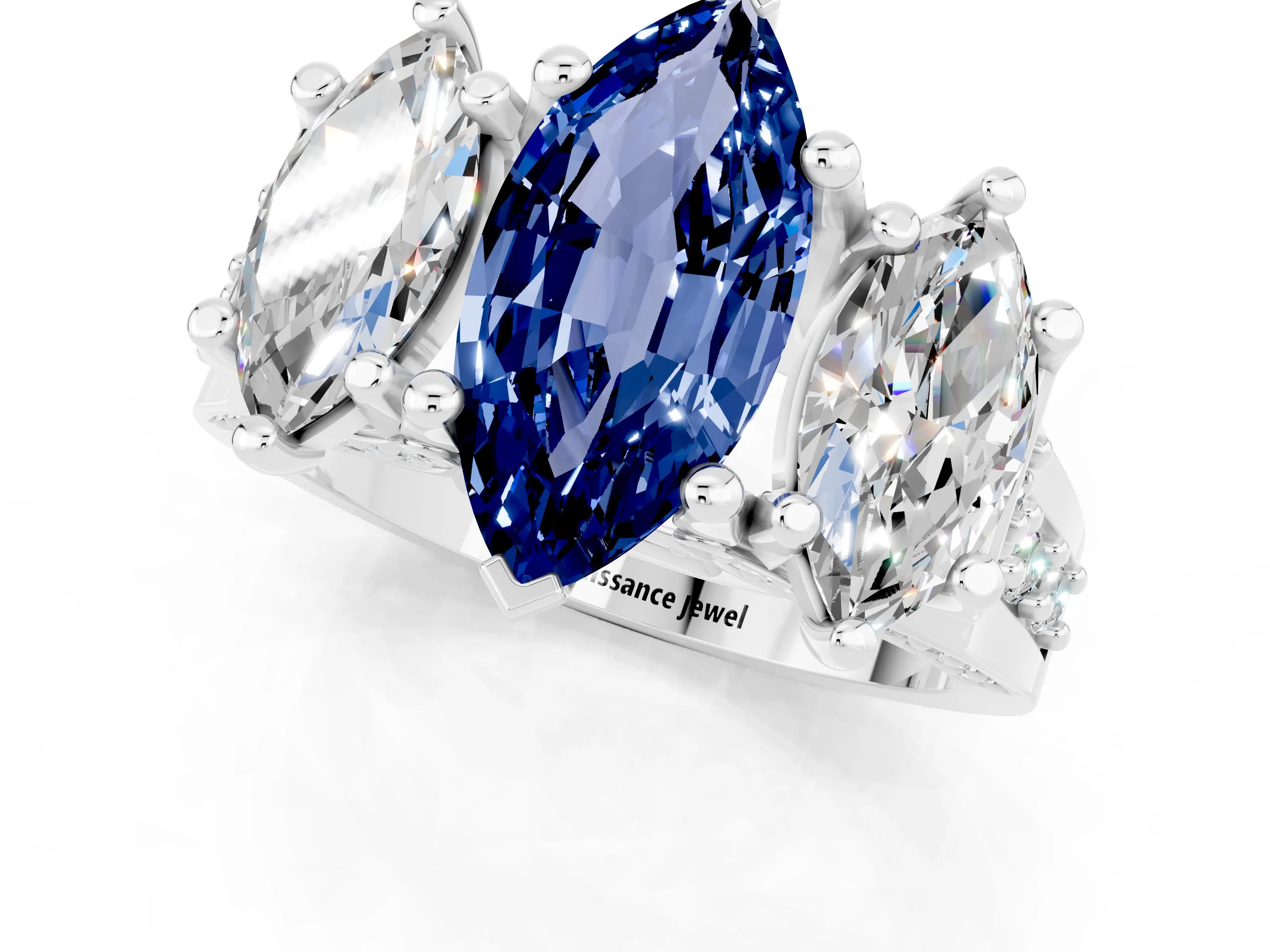 White gold Marquise Cut Blue Sapphire Three-Stone Ring with Channel Set Band and Four-Prong Setting_1