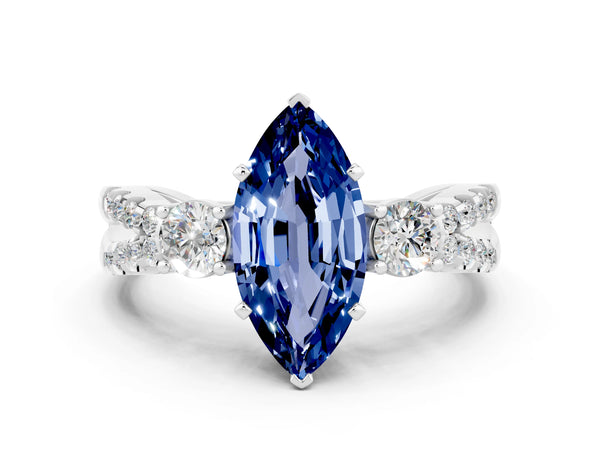 White gold Marquise Cut Blue Sapphire Three-Stone Ring with Pavé Split Shank and Four-Prong Setting