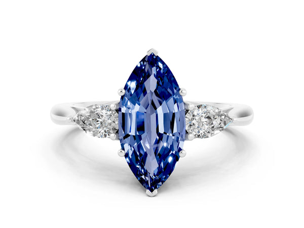Platinum Marquise Cut Blue Sapphire Three-Stone Ring with Pear  Side Stones and Prong Setting