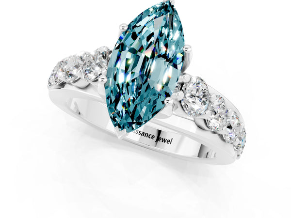 White gold Marquise Cut Blue Topaz Engagement Ring with Pavé Band and Four-Prong Setting