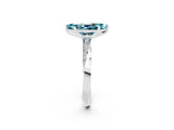 White gold Marquise Cut Blue Topaz Engagement Ring with Side Stone Accents and Four-Prong Setting_26