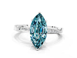 White gold Marquise Cut Blue Topaz Engagement Ring with Side Stone Accents and Four-Prong Setting_27