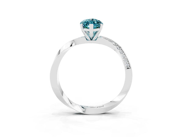 Silver Marquise Cut Blue Topaz Engagement Ring with Side Stone Accents and Four-Prong Setting