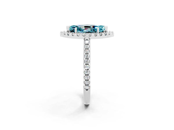 Platinum Marquise Cut Blue Topaz Pavé Halo Ring with Four-Prong Setting