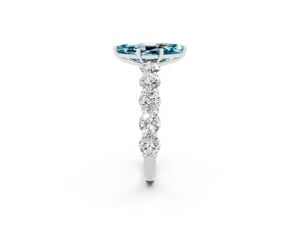 White gold Marquise Cut Blue Topaz Prong Setting with Side Stones on a Pave Band
