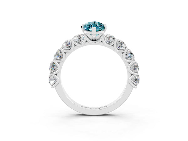 Silver Marquise Cut Blue Topaz Prong Setting with Side Stones on a Pave Band