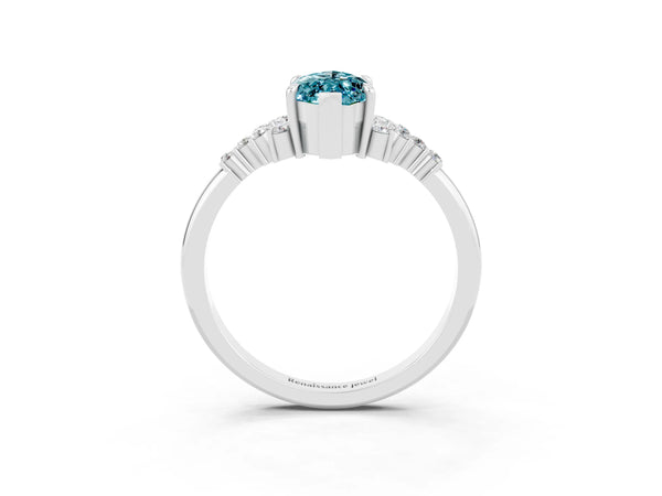 White gold Marquise Cut Blue Topaz Ring with Side Stones and Four-Prong Setting