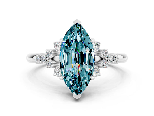 Silver Marquise Cut Blue Topaz Ring with Side Stones and Four-Prong Setting