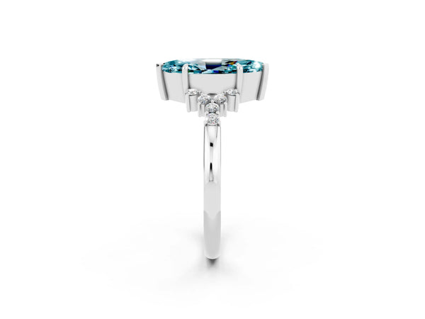 Silver Marquise Cut Blue Topaz Ring with Side Stones and Four-Prong Setting