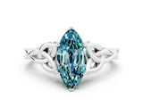 White gold Marquise Cut Blue Topaz Solitaire Engagement Ring with Celtic Knot Band and Four-Prong Setting