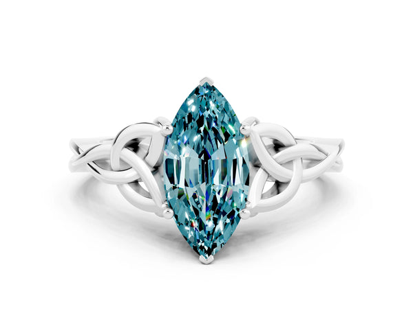 Platinum Marquise Cut Blue Topaz Solitaire Engagement Ring with Celtic Knot Band and Four-Prong Setting