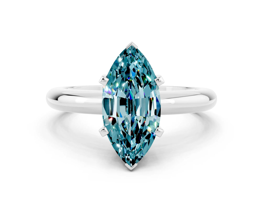 White gold Marquise Cut Blue Topaz Solitaire Engagement Ring with Round Band and Four-Prong Setting