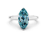 White gold Marquise Cut Blue Topaz Solitaire Engagement Ring with Round Band and Four-Prong Setting