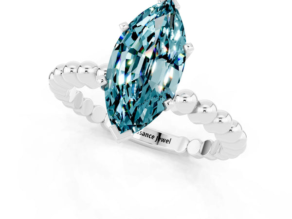 Silver Marquise Cut Blue Topaz Solitaire Ring with Beaded Band and Prong Setting