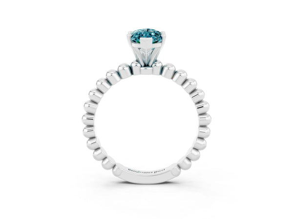 Silver Marquise Cut Blue Topaz Solitaire Ring with Beaded Band and Prong Setting