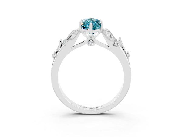 White gold Marquise Cut Blue Topaz Solitaire Ring with Leaf Motif Band and Four-Prong Setting