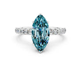 White gold Marquise Cut Blue Topaz Solitaire Ring with Pavé Accents and Four-Prong Setting
