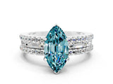 White gold Marquise Cut Blue Topaz Solitaire Ring with Pavé and Channel Set Band