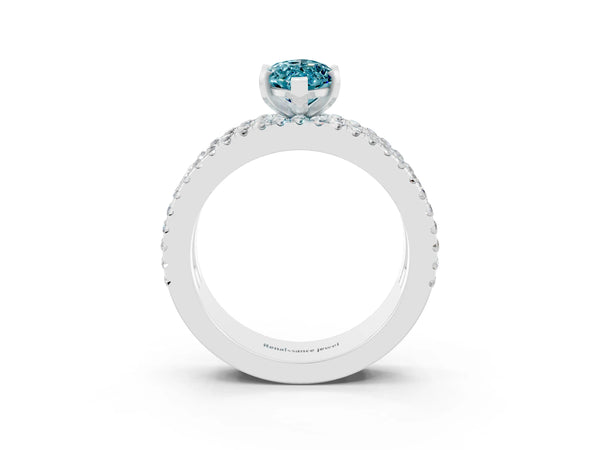 Platinum Marquise Cut Blue Topaz Solitaire Ring with Pavé and Channel Set Band