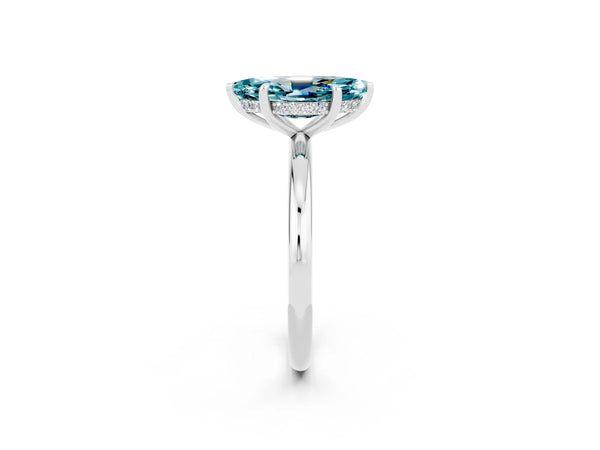 Silver Marquise Cut Blue Topaz Solitaire Ring with Thin Band and Four-Prong Setting