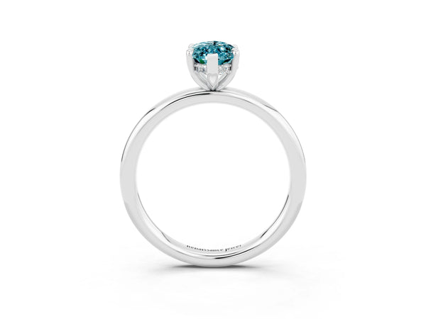 Platinum Marquise Cut Blue Topaz Solitaire Ring with Thin Band and Four-Prong Setting