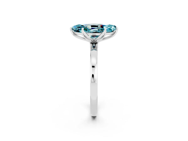 Platinum Marquise Cut Blue Topaz Solitaire Ring with Thin Band and Prong Setting