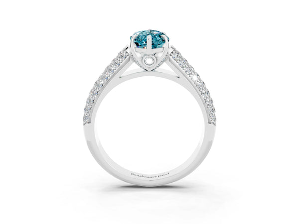 Platinum Marquise Cut Blue Topaz Solitaire Ring with Three-Row Pavé Band and Four-Prong Setting