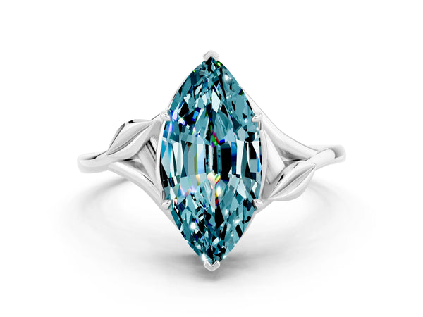 Platinum Marquise Cut Blue Topaz Solitaire Ring with Twist Band and Four-Prong Setting